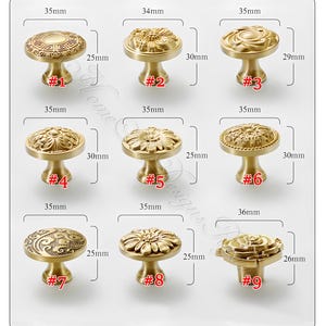 May include: Nine antique brass cabinet knobs with various decorative designs, including floral and geometric patterns. Each knob has a different design and is approximately 3.5cm in diameter. The heights vary from 2.5cm to 3cm.