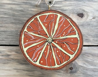 Orange slice woodburned ornament