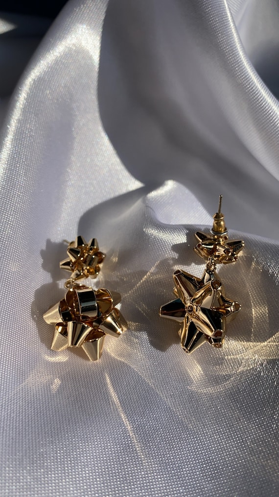 Bow dangle earrings sale