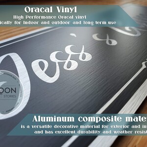 May include: A black aluminum composite sign with a silver border and the word "Less" written in a silver cursive font. The sign is made with high performance Oracal vinyl, which is waterproof and weather resistant. The sign is made by Boon Stories.