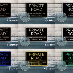 May include: A set of ten signs with the text "Private Road Kettlesing Cottage Guests Only" in white lettering on a black background. The signs are shown in different colors: bronze, copper, blue, gold, beige, silver, white, yellow, and green.