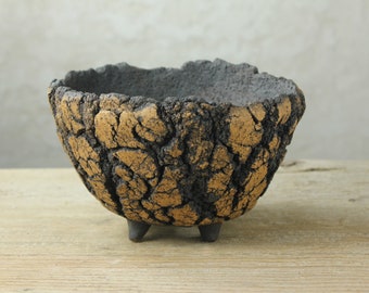 Crackled pot with broken edges