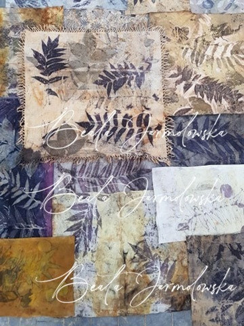 May include: A collage of fabric squares with a botanical theme. The fabric is a light brown color with a pattern of leaves and branches. The fabric is stitched together with a decorative stitch. The artist's name, "Beata Jarmolowska", is written in cursive on the fabric.