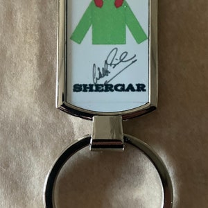 ウォルター・スウィンバーンのサイン入りシャーガーキーホルダー（競馬）