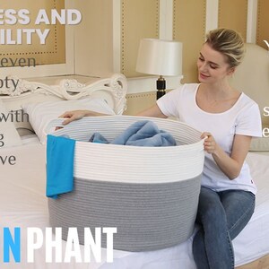 May include: A white and gray rope storage basket with handles. The basket is filled with folded blue fabric. The text "FIRMNESS AND DURABILITY" is in the upper left corner of the image. The text "stand tall even when empty" is below the first text. The text "Navigate with ease using unobtrusive handles." is below the second text. The text "COTTON PHANT" is in the lower left corner of the image. The text "You won't find this level of sturdiness elsewhere." is in the upper right corner of the image.