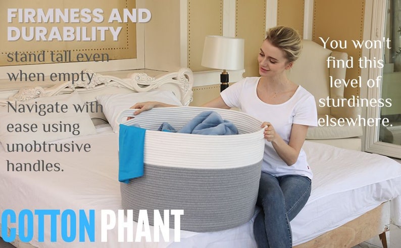 May include: A white and gray rope storage basket with handles. The basket is filled with folded blue fabric. The text "FIRMNESS AND DURABILITY" is in the upper left corner of the image. The text "stand tall even when empty" is below the first text. The text "Navigate with ease using unobtrusive handles." is below the second text. The text "COTTON PHANT" is in the lower left corner of the image. The text "You won't find this level of sturdiness elsewhere." is in the upper right corner of the image.
