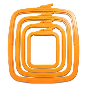 May include: Set of four orange embroidery hoops, nested inside each other, with the largest hoop at the bottom and the smallest hoop at the top.