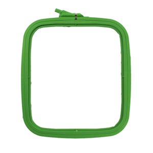 May include: Green plastic embroidery hoop with a 120 x 170 mm measurement.
