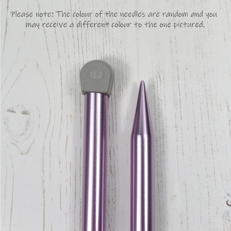 May include: A pair of purple knitting needles, one with a gray tip marked "15.0".