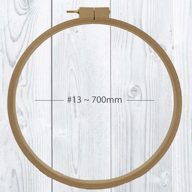 May include: A wooden embroidery hoop with a diameter of 700mm, also known as size #13. The hoop is made of natural wood and has a smooth finish.