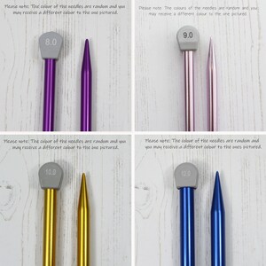 May include: Four pairs of knitting needles in different sizes and colors. The needles are made of metal and have a gray plastic tip. The sizes of the needles are 8.0, 9.0, 10.0, and 12.0.