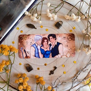 May include: A vintage-style illustration of three people, two men and one woman, standing together. The woman is wearing a blue dress and a necklace. The men are wearing suits. The background is a brown and gold color with musical notes and a violin.