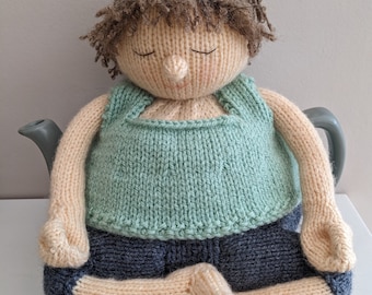 Tea cosy knitting pattern. PDF digital download. Betty takes up yoga. Knitting pattern for a 6 cup teapot. Knitted flat. ENGLISH ONLY