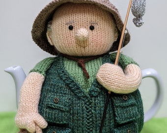 Tea cosy knitting pattern. PDF digital download. Monty goes fishing. Tea cosy knitting pattern for a 6 cup teapot.