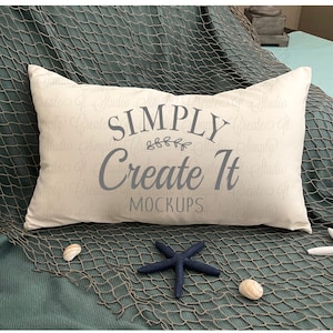 May include: A white pillow with the text "SIMPLY Create It MOCKUPS" in gray on a green and brown fishing net background.