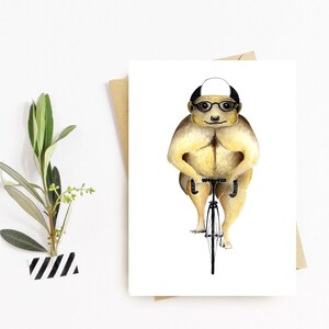 Suricate sur une carte postale de vélo, carte postale animale, cadeau pour les cyclistes