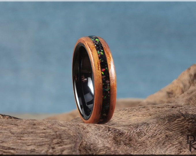 Bentwood Ring - Golden Hawaiian Koa w/Black Tourmaline and Opal inlay, on polished black ceramic ring core - wood ring