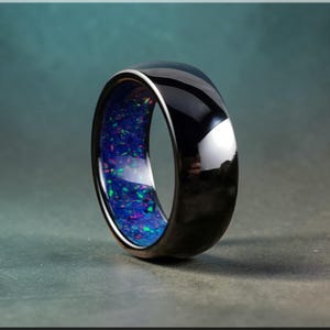 Bague en céramique noire avec incrustation d'opale