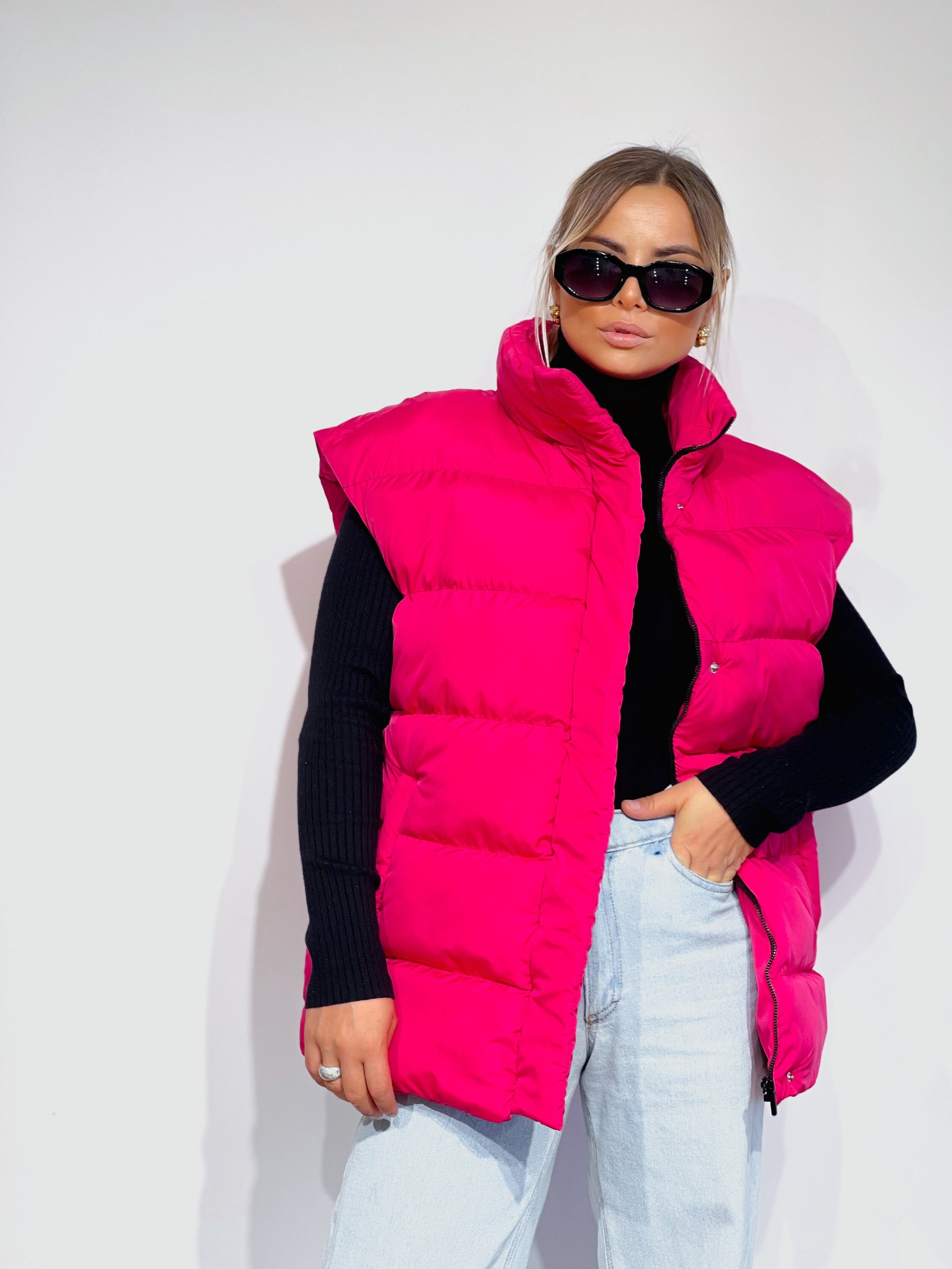 bright pink puffer vest