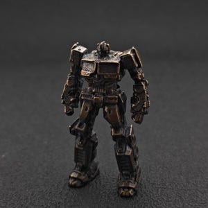 Brass Optimus Prime Figurine – Miniature Transformer Sculpture, Desk Display, Sci-Fi Collector Item