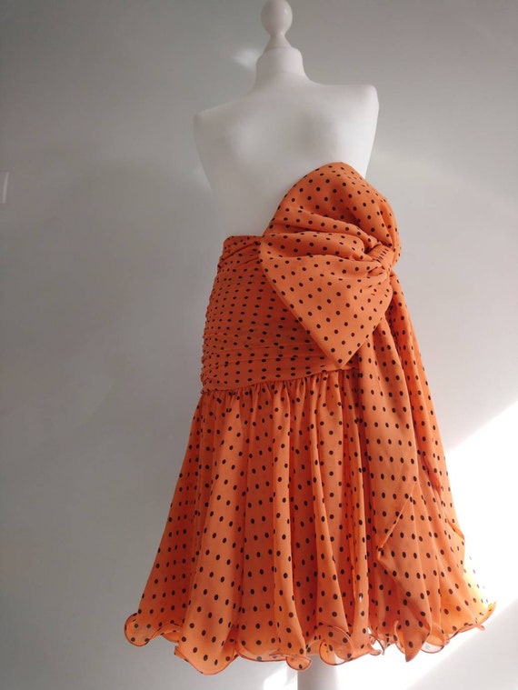 Polka dot skirt with oversized bow