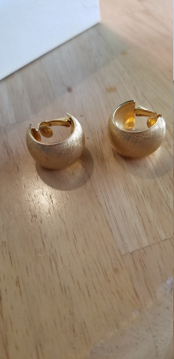 Gold Avon clip on earrings