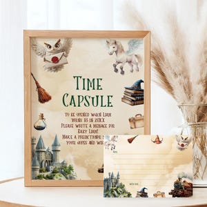 May include: A printable time capsule sign with a whimsical Harry Potter theme. The sign features an owl, a unicorn, a broom, a castle, and a suitcase. The text reads "Time Capsule" and "To be opened when Liam turns 18 in 20XX. Please write a message for baby Liam! Make a prediction for your hopes and wishes."