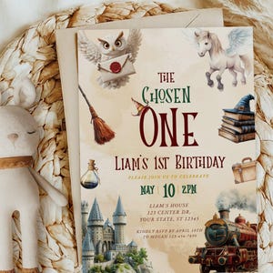 May include: A whimsical birthday invitation with a Harry Potter theme. The invitation features a white owl with a letter, a white unicorn, a castle, a train, and a broom. The text reads "The Chosen One, Liam's 1st Birthday, Please join us to celebrate, May 10, 2PM, Liam's House, 123 Center Dr, Your State, ST 12345, Kindly RSVP by April 10th to Megan 123-456-7890".