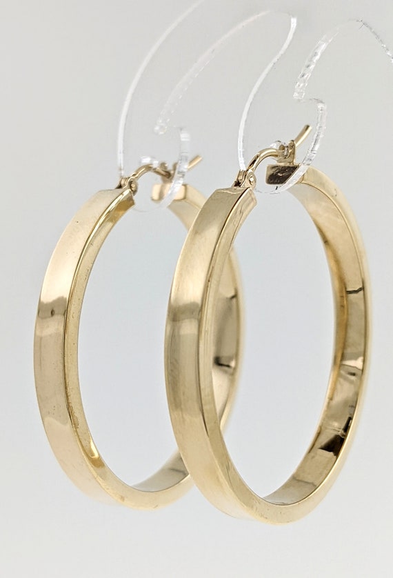 10k yellow gold Polished hoops