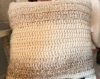 crocheted throw pillow