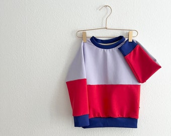 cool mix & match color block sweater in red, blue and lilac