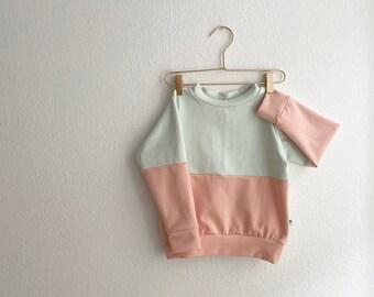 pastel color block sweater in lightmint and pink