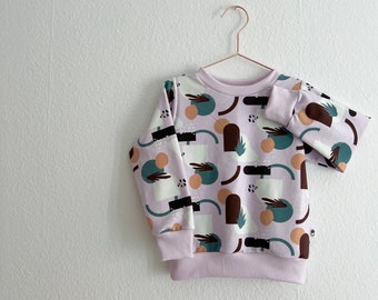 cooler Sweater in light flieder mit abstraktem Print und gerippten Bündchen