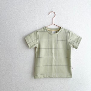 cool T-shirt in light green with minimalist grid print image 1