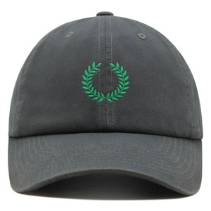May include: A gray cotton baseball cap with a green embroidered laurel wreath design.