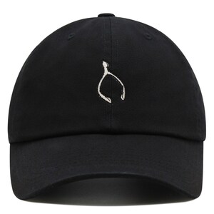 May include: A black baseball cap with a white embroidered wishbone design.