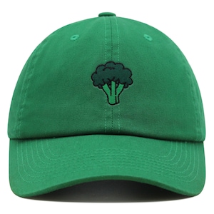 May include: A green baseball cap with an embroidered broccoli design.