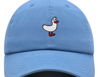 May include: A light blue baseball cap with an embroidered white duck with red beak and feet.