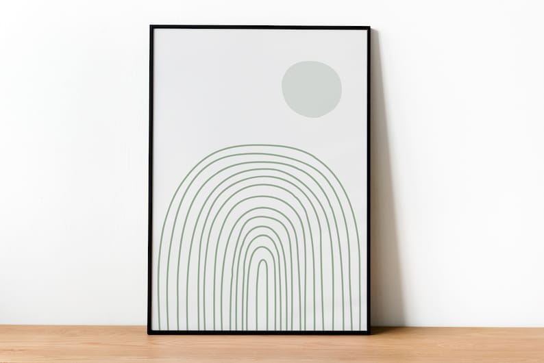 Pu&ograve; includere: Una stampa incorniciata con un design minimalista che presenta un arco verde e un cerchio verde chiaro su uno sfondo bianco.