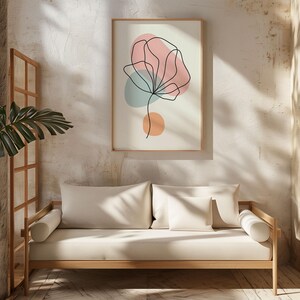 May include: A minimalist abstract art print with a black line drawing of a flower with pink, blue, and orange abstract shapes.