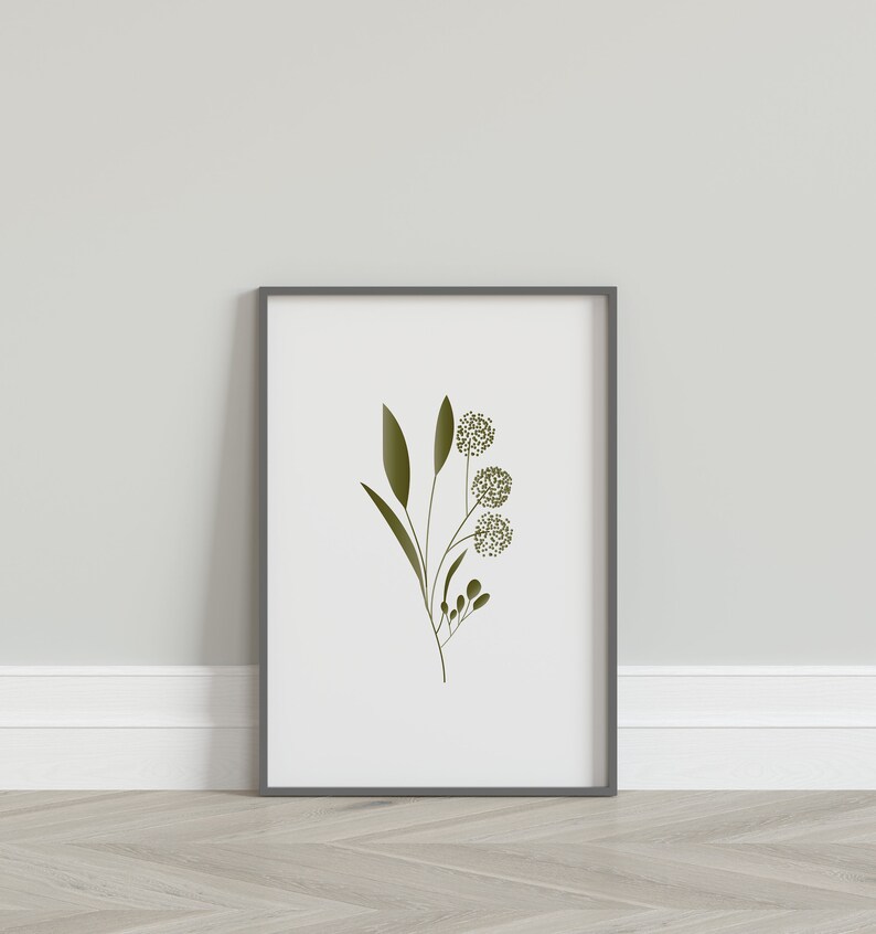 May include: A framed print of a minimalist botanical illustration featuring a green stem with leaves and three small, round, green flower buds.