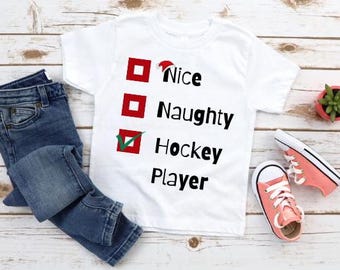 Diseño navideño de jugador de hockey travieso y simpático (descarga digital PNG SVG)