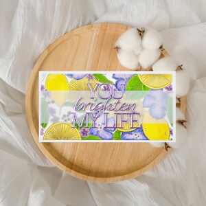Porte-monnaie pour un proche, carte de paiement avec citrons et fleurs violettes