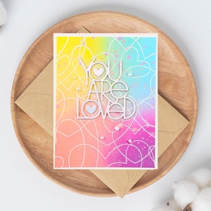 Carte d'amour aux couleurs vives du néon, vous êtes aimé
