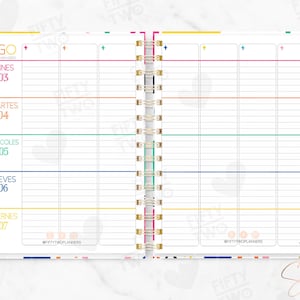 May include: An open spiral-bound planner with white pages featuring a weekly layout. The left page lists days from Monday to Friday in Spanish with colorful horizontal lines. The top right corner displays the text FIFTY TWO PLANNERS.