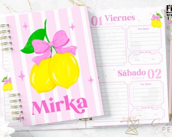 May include: A spiral-bound planner with a light pink and white striped cover featuring a yellow lemon illustration with a pink bow and the name Mirka in pink text. The open interior pages show daily schedule layouts with the text Viernes and Sábado.