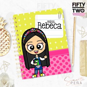 May include: A spiral-bound planner with a cartoon illustration of a girl on the cover. The cover is lime green with white crosses and a pink polka-dot section. The text "miss. Rebeca" is on the cover.