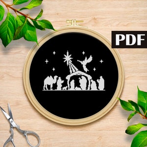 Schema punto croce Natività Gesù bambino ricamo Presepe notte silenziosa oh notte santa PDF punto croce religioso Presepe di Natale
