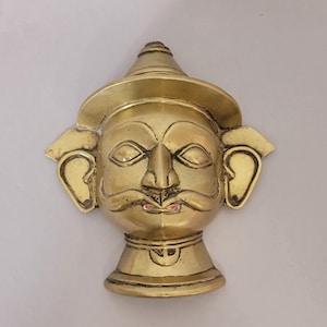 Shiva Mask. 1800s. Golden Brass.