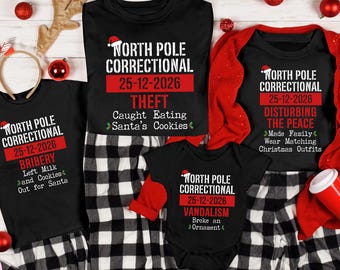 May include: Four black t-shirts and a baby bodysuit featuring the text North Pole Correctional, the date 25-12-2026, and various humorous offenses like Theft, Bribery, Disturbing the Peace, and Vandalism, all printed in white and red.